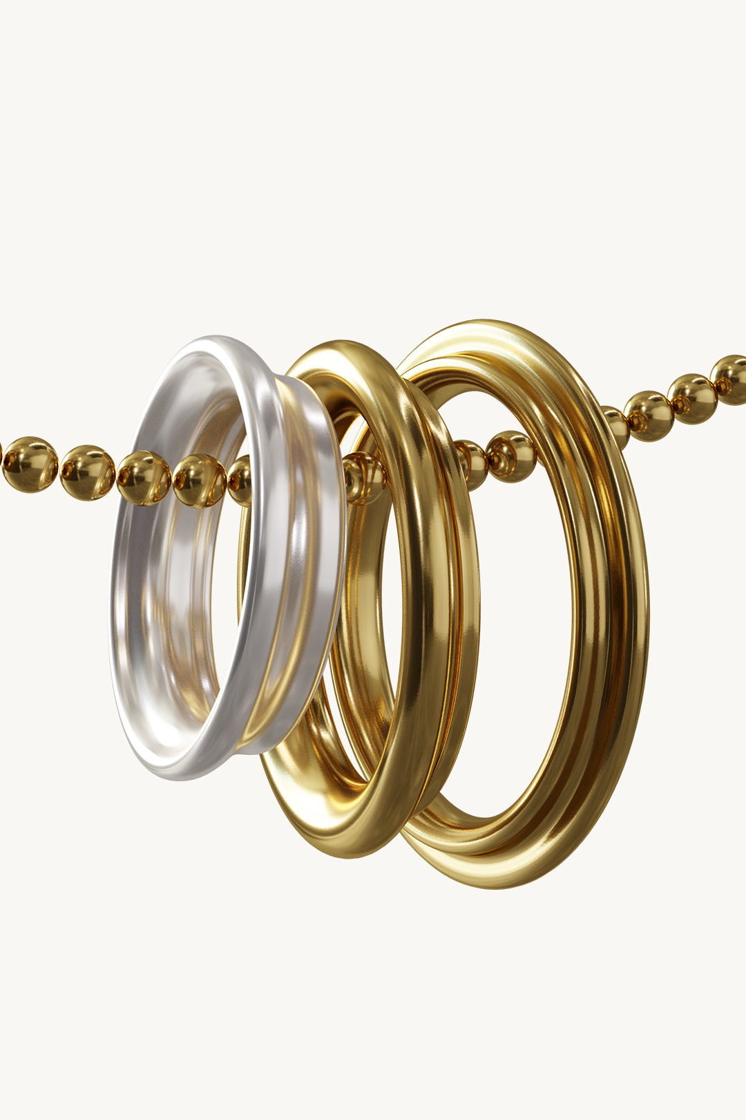 VARIATIONS. LE COLLIER TRIPLE ANNEAUX